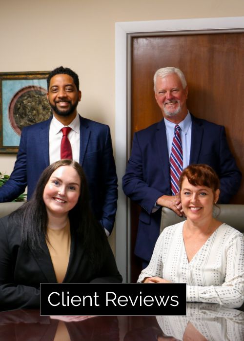 Sikes Law Group attorneys in a group photo