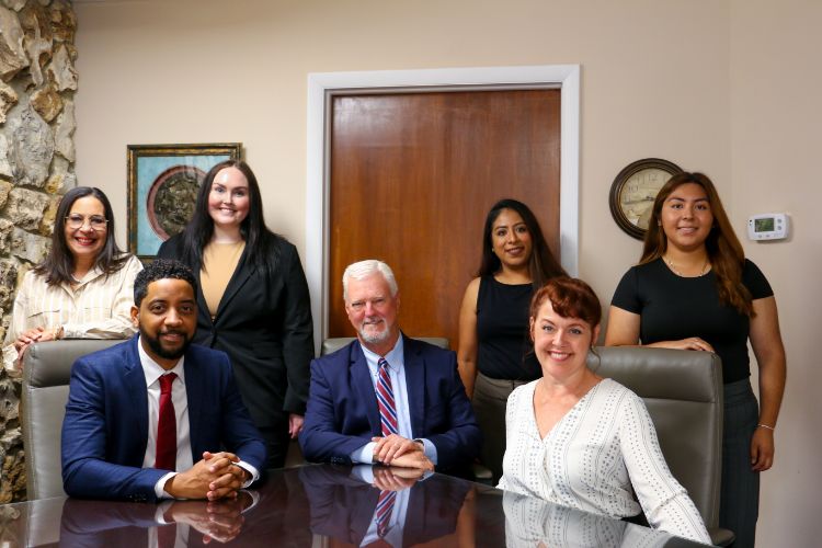 Sikes Law Group Team in an office